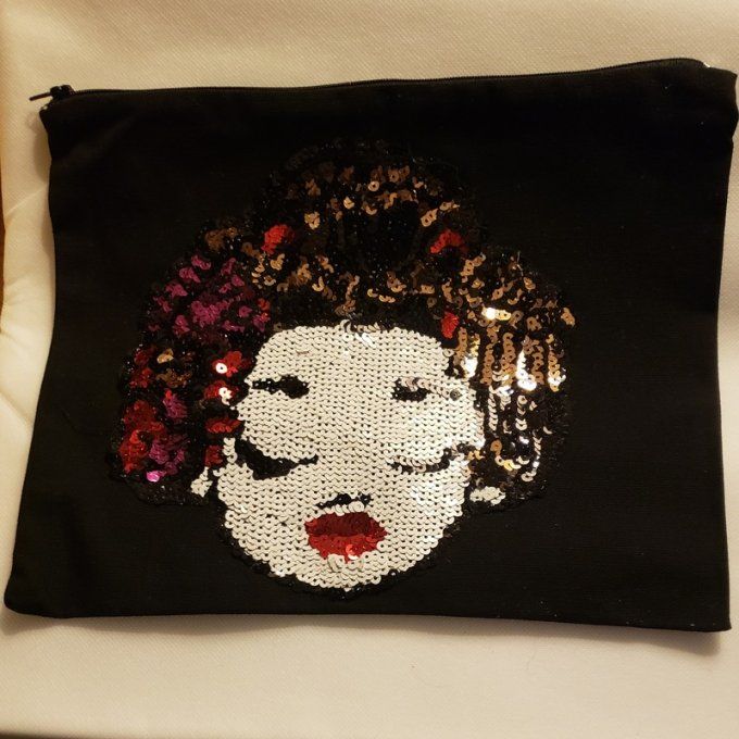Pochette noire avec tête de femme pailletée et colorée